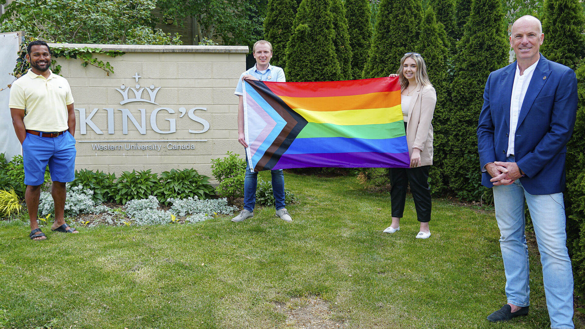 King's raising Pride flag